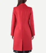 Side view of an Elsbeth Tascioni Elsbeth Red Wool Coat showing the high-quality stitching and thick wool texture.
