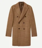 Ryan Eggold wearing a tan My Secret Santa long wool overcoat for a My Secret Santa film wool coat.
