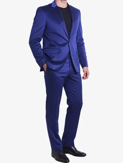 A man wearing a deep navy blue velvet Royal Blue Slim Fit 2 Piece Velvet Tuxedo with a black shawl lapel and a slim-fit silhouette.