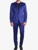 A man wearing a vibrant Royal Blue Slim Fit 2 Piece Velvet Tuxedo with black lapels and a slim-fit tailored design.