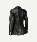 Back view of women’s fancy black leather blazer showing tailored seams and three cuff buttons