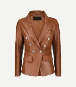 Front view of womens double breasted brown leather blazer with shiny buttons, notch lapel, and flap pockets