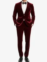 A man wearing a sharp Mens 2 Piece Maroon Velvet Tuxedo with black satin-style lapels and a slim-fit design.