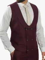 A men’s formal Mens Peak Lapel 3 Piece Burgundy Suit featuring a sharp peak lapel jacket, a matching vest, and trousers.