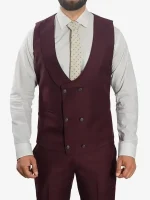 A man wearing a Mens Peak Lapel 3 Piece Burgundy Suit featuring sharp peak lapels and a slim-fit tailored silhouette.