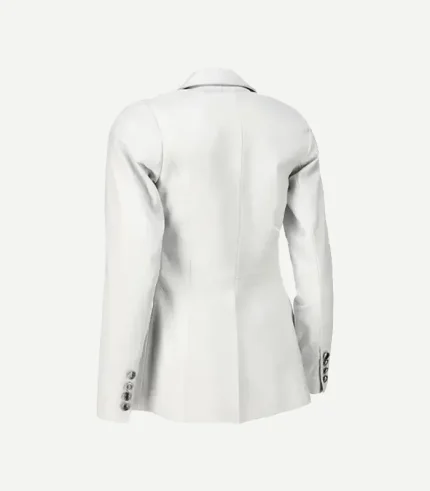 Back angled view of womens white leather blazer with fitted seams and buttoned cuffs.