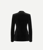 The back view of the black velvet shawl lapel tuxedo jacket, showcasing its fitted waist and clean lines. The rich, matte texture of the velvet is prominent.