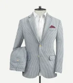 A Blue Seersucker Style Suit featuring a matching jacket and trousers with a classic textured finish.