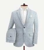 A Blue Seersucker Style Suit two piece set featuring a smart striped pattern and matching trousers.