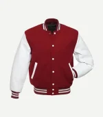 A three-quarter view of the cardinal jacket, highlighting the deep maroon wool body against the white leather sleeves. The collar and cuffs are cardinal red with white stripes.