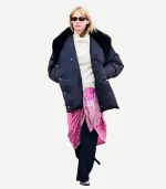 Close up of a Jennifer Lawrence Puffer Coat showing the detailed quilting and smooth, weather-resistant fabric.