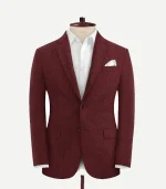 A Maroon Seersucker Style Suit including a matching coat and trousers in a rich, dark red textured fabric.
