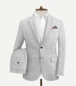 A Mens Gray Seersucker Style Suit styled with a crisp shirt for a clean and sophisticated appearance.