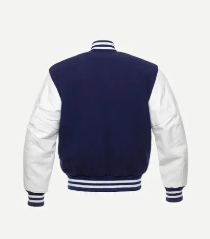Back view of a navy blue and white varsity jacket showing the solid dark wool body, white leather sleeves, and striped elastic waistband.