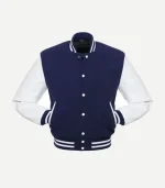 Front view of a navy blue varsity jacket with white leather sleeves, white snap buttons, and striped ribbed collar and cuffs on a plain background.