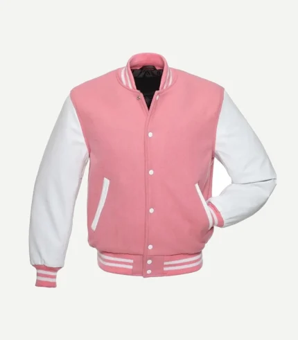 Side-angled view of a pink wool varsity jacket featuring white leather sleeves, white snap fasteners, and striped rib-knit trim on the collar and waistband.