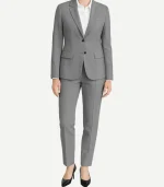 Womens Light Grey Suit featuring a tailored two-piece set with a single-breasted blazer and matching high-waisted trousers.