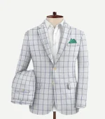A White Checks Seersucker Style Suit with a matching jacket and trousers featuring a clean grid pattern.