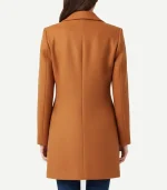 Womens Mid Length Rust Wool Coat in a vibrant burnt orange hue featuring a streamlined silhouette and soft-touch finish.