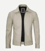 Menswear-style beige leather jacket shown from the front with a full-length zipper, smooth leather finish, pointed collar, and a modern, tailored silhouette.