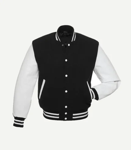 A front-angled view of a classic varsity jacket with a black wool body and white leather sleeves. The jacket features a ribbed stand-up collar, white snap-button closures, and two slanted front pockets with white trim. The cuffs and waistband are black with two horizontal white stripes.