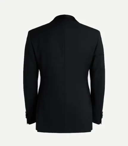 The back of the double-breasted jacket shows a classic tailored silhouette with a clean finish and no vent, maintaining a formal structure.