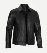Front view of a sleek black leather jacket featuring a classic pointed collar, full-zip closure, vertical side pockets, and a tailored, contemporary fit.