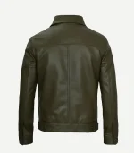 Rear view of a dark green leather jacket featuring a prominent back yoke, vertical center seam, and buttoned tabs at the waistband.