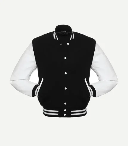 A direct front view of a black and white varsity jacket. The garment showcases a monochromatic design with a solid black torso and contrasting bright white sleeves. It includes a white snap-front fastening and striped ribbed detailing on the collar, hem, and cuffs.