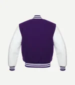 Rear view of a deep purple varsity jacket with white leather sleeves and striped rib-knit detailing on the collar, cuffs, and bottom hem.