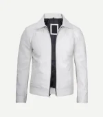 Three-quarter view of a white leather jacket showing vertical seam details, side welt pockets, and a contrasting black interior lining.