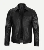 Front view of a women's black leather jacket with a structured collar, metallic zipper, and vertical paneling for a contoured, slim-fit silhouette.