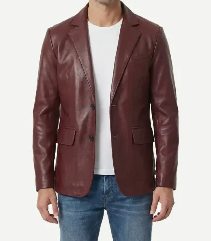 Straight-on front view of a tailored maroon leather blazer jacket for men, styled open over a white t-shirt and jeans.